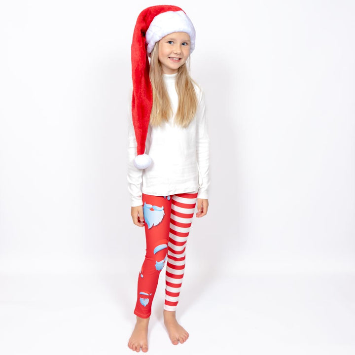 Barn i højtaljede mønstrede leggings. Meget elastiske og perfekt til leg og hverdag. Ikke gennemsigtige