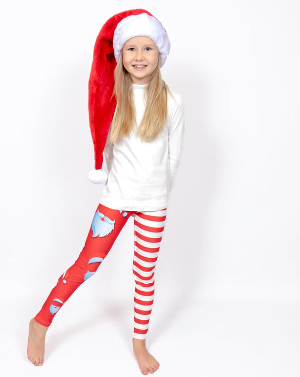 Barn i højtaljede mønstrede leggings. Meget elastiske og perfekt til leg og hverdag. Ikke gennemsigtige